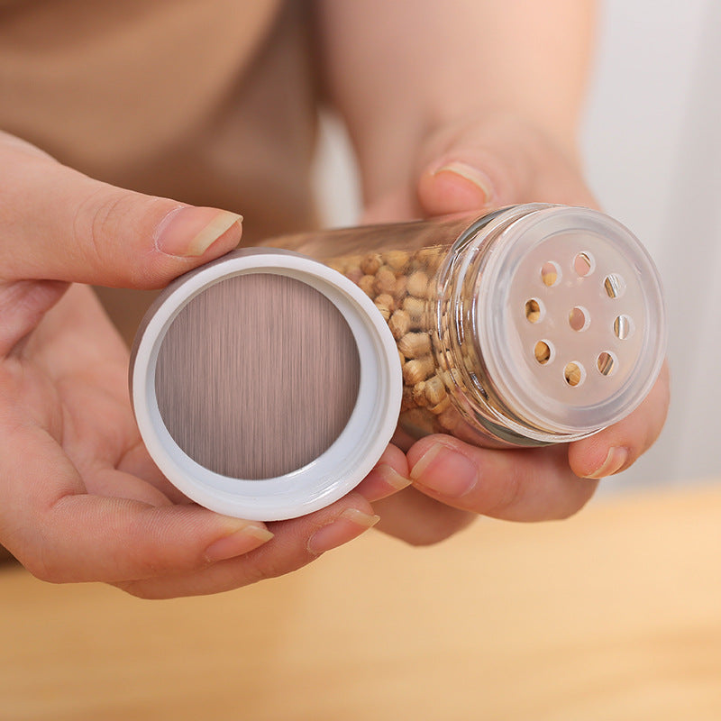 Elevate Your Kitchen with the Stainless Steel Glass Spice Jar